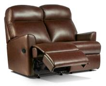 Sofa shown with manual catch option in Louisiana Cognac leather 