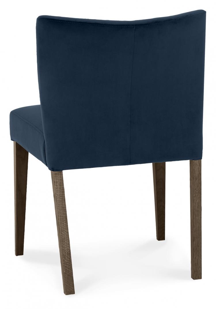 Back of the Bentley Designs Turin Dark Oak Low Back Uph Chair in Dark Blue Velvet Fabric