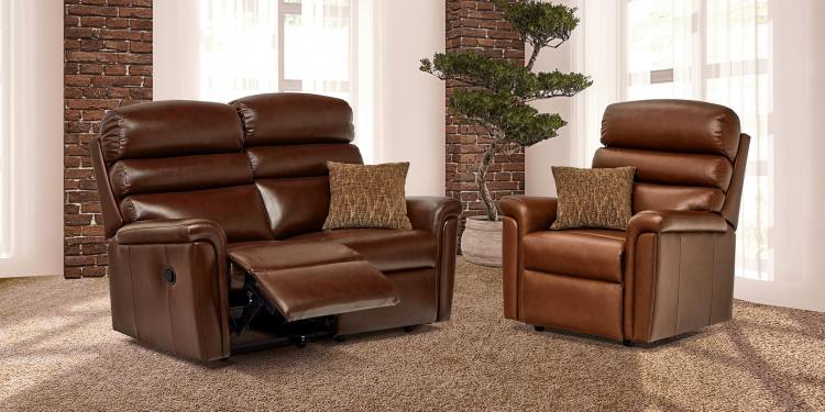 Two seater recliner sofa shown with fixed chair 