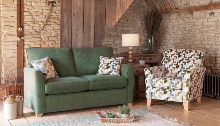 Reuben 2 seater sofa in 4820 with scatters in 4140. Cosy accent chair in 4140.