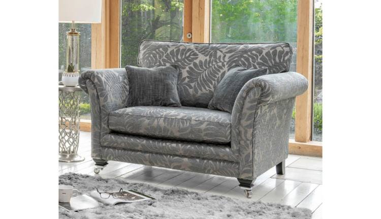 Alstons Lowry Snuggler shown in fabric 2437 (1), price band F)  with scatter cushions in 2977 (1) 