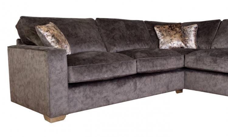 View of L2 section of corner sofa in Jive Charcoal with scatter cushions in Orb Gold