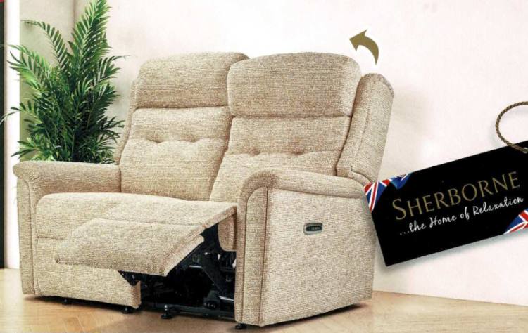 Power recliner sofa shown in fabric with head tilt option 