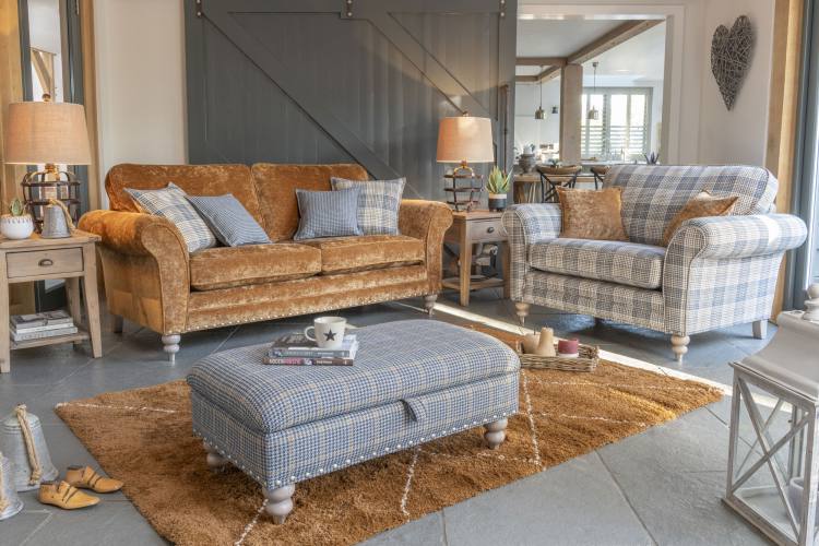 seater sofa (standard back ) in fabric 2743, large scatter cushions in 2507, small scatter cushions in 2557, grey ash/brushed nickel legs. Snuggler in fabric 2507, small scatter cushions in 2743, grey ash/brushed nickel legs. Legged ottoman in fabric 2487