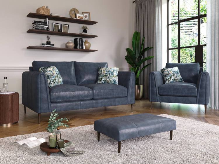 Chair shown with sofa & footstool from the Harlow range in Turino Blue leather 