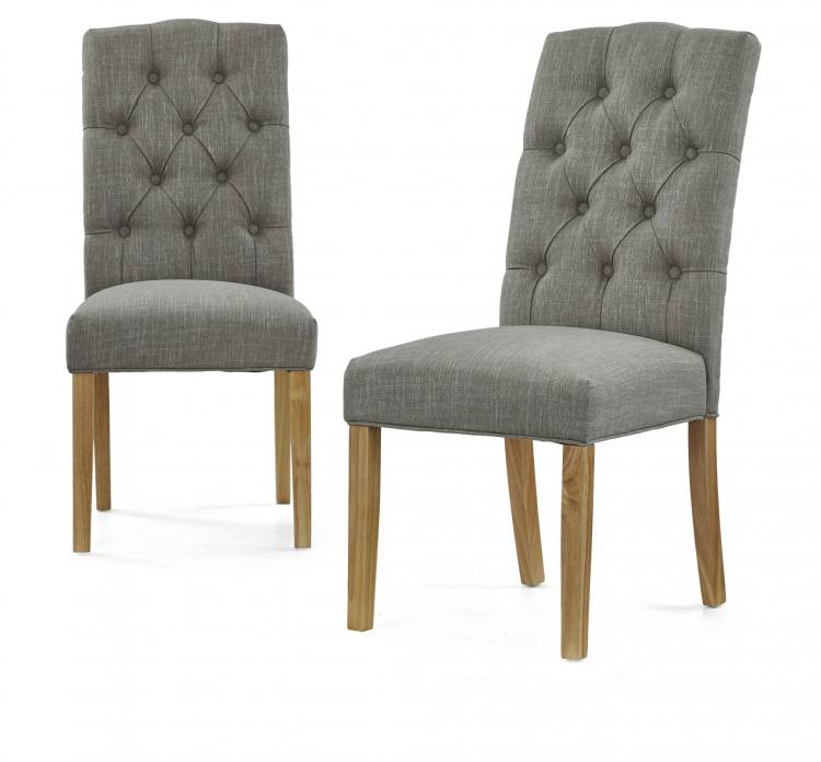 Button back chairs pictured in grey fabric